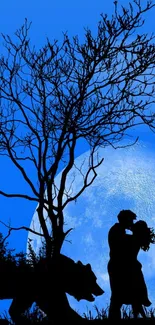 Romantic silhouette of couple and wolf under moonlit tree.