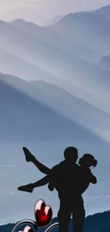 Silhouette of a couple in love with mountain backdrop.