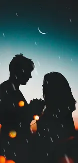 Silhouette of couple under crescent moon with glowing orbs in teal sky.