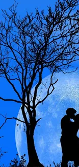 Romantic couple silhouette under a blue moonlit sky with a tree.