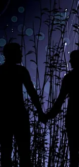 Silhouette of a couple under a starry purple night sky with tall grass.