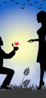 Silhouette of a man proposing with a heart at sunset.