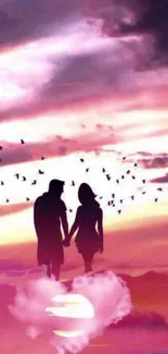 Silhouette of couple at pink sunset with birds and clouds.