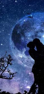 Silhouette of a couple kissing under a starry moonlit sky.