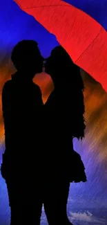 Romantic couple kissing under a red umbrella with blue background.