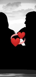 Romantic silhouette of a couple with red hearts.