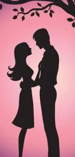 Romantic couple silhouette on pink background with tree and flowers.