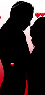 Silhouette of a couple with red hearts on a gradient red background wallpaper.