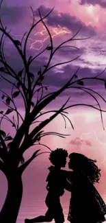 Silhouette of couple under a purple sky with lightning and tree.