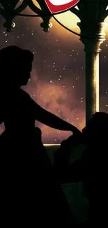 Silhouette of a romantic couple under a starry sky.