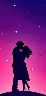 Silhouette of couple kissing under a purple and pink starry sky.