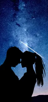 Silhouetted couple under starry night sky with shooting star.