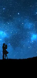 Silhouette couple under a starry night sky, surrounded by a glowing galaxy.