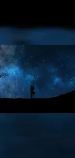 Silhouetted couple under a starry night sky, creating a romantic landscape.