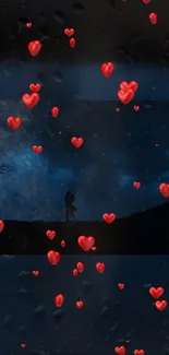 Silhouette of a couple under a starry sky with red hearts falling.