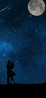 Romantic starry night with a silhouetted couple under the moon.