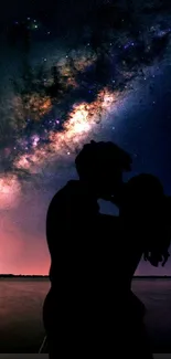 Romantic couple silhouette against a galaxy starry night.