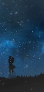 Silhouette of couple under starry night sky with vibrant blue hues.