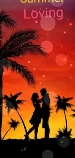 Silhouette of a couple with palm trees at sunset.