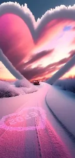 Heart-shaped sunset sky over a snowy road, creating a romantic mobile wallpaper.