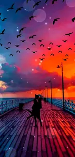 Romantic couple silhouette on sunset pier with colorful sky and birds.