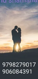 Silhouette of couple at sunset with dramatic sky.