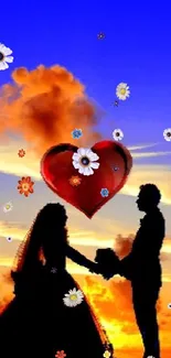 Silhouette of a couple holding hands under a vibrant sunset sky with a heart-shaped cloud.