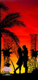 Romantic silhouette against a red-orange sunset backdrop with palm trees.