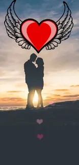 Silhouette couple with heart wings at sunset on ocean beach.