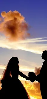 Silhouette of couple holding hands at sunset, creating a romantic and elegant scene.