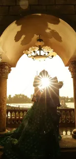 Romantic sunset silhouette through stone archway with golden light.