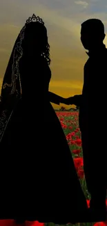 Silhouette of a couple in front of a sunset and poppy field.