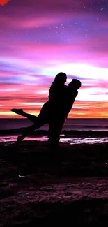 Silhouette of a couple embracing at sunset with a purple sky.