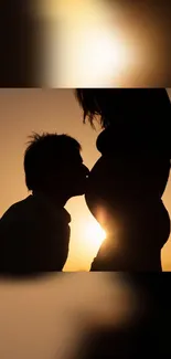 Silhouette of a couple with sunset background, showcasing love and tranquility.