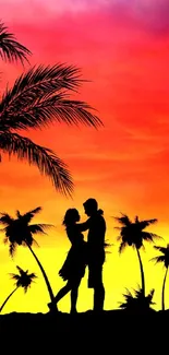 Silhouette of couple at sunset with palm trees and vibrant sky.