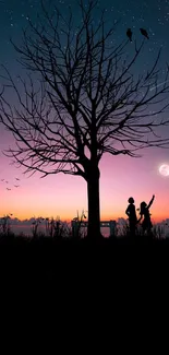 Silhouette of a couple under a tree with a sunset background.