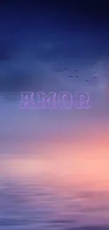 Romantic sunset wallpaper with ocean and text 'AMOR' in purple.