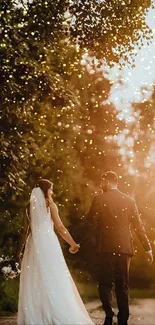 Couple walking during sunset wedding under trees.