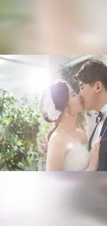 Romantic wedding couple sharing a kiss, surrounded by elegant light.