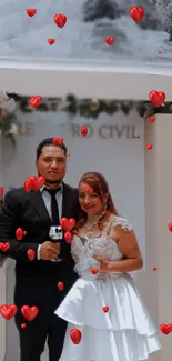 Wedding couple with red hearts on wallpaper.