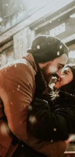 Romantic couple embracing in snowy street at night.