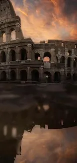 Majestic Roman Colosseum at sunset with reflection in water and vibrant orange sky.