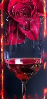 Red rose submerged in a wine glass with fiery background.