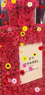 Chanel No. 5 bottle crafted from pink roses.