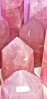 Rose quartz crystals with pink hues for mobile wallpaper.