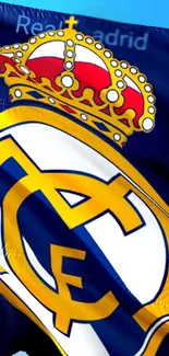 Real Madrid emblem with royal blue background.