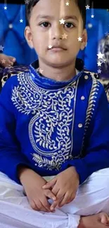 Child wearing royal blue outfit with stars on a vibrant background.