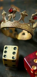 Golden crown and dice on dark background.