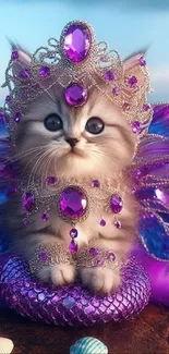 A kitten with purple jewels and wings sitting regally.