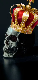 Skull wearing a royal crown on a dark background wallpaper.